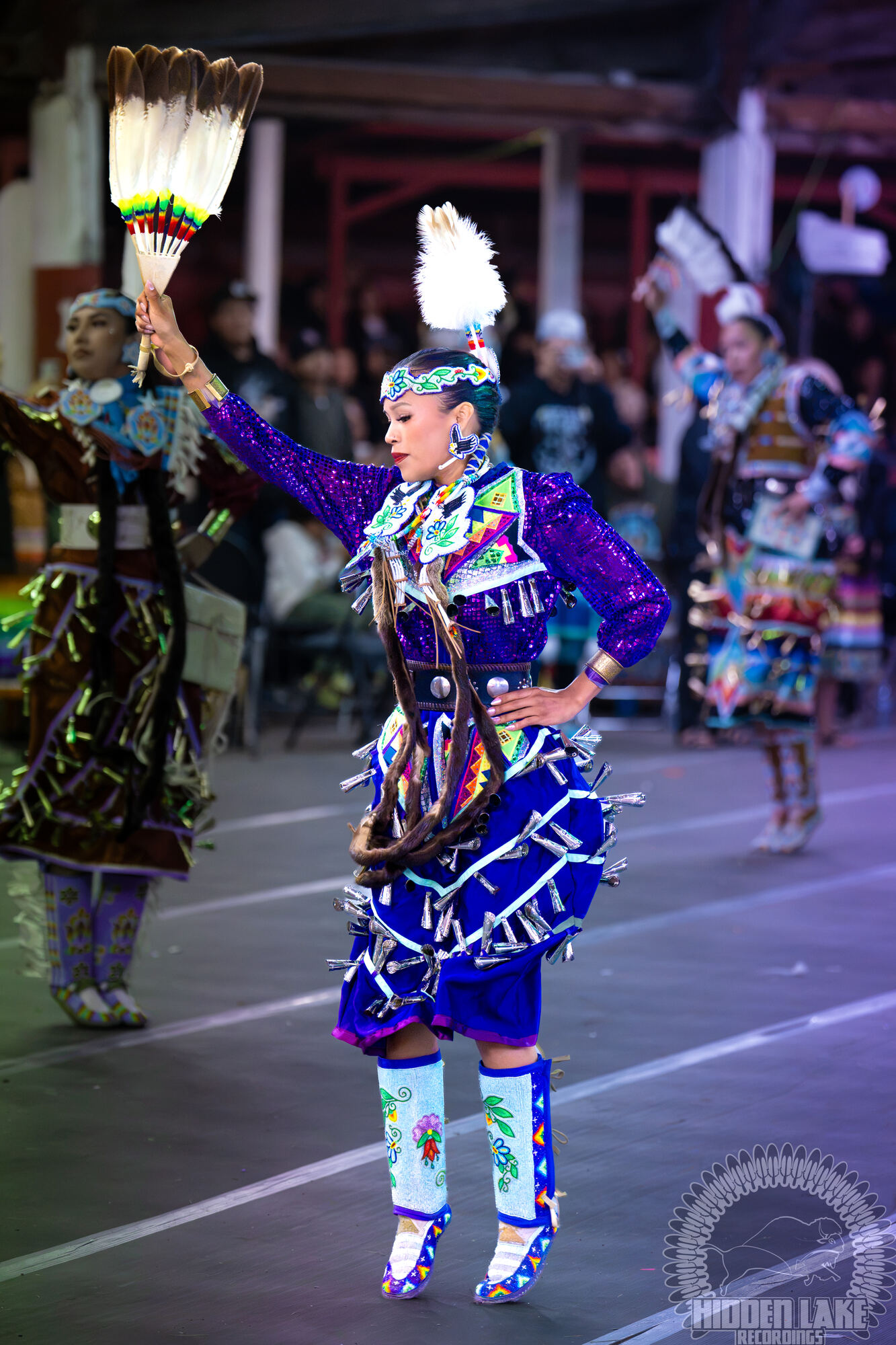 Dancer under purple arena lights